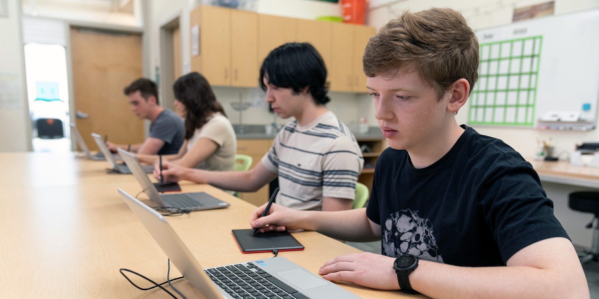 An art student working on a digital tablet, with abstract AI-generated shapes appearing beside hand-drawn sketches on the screen