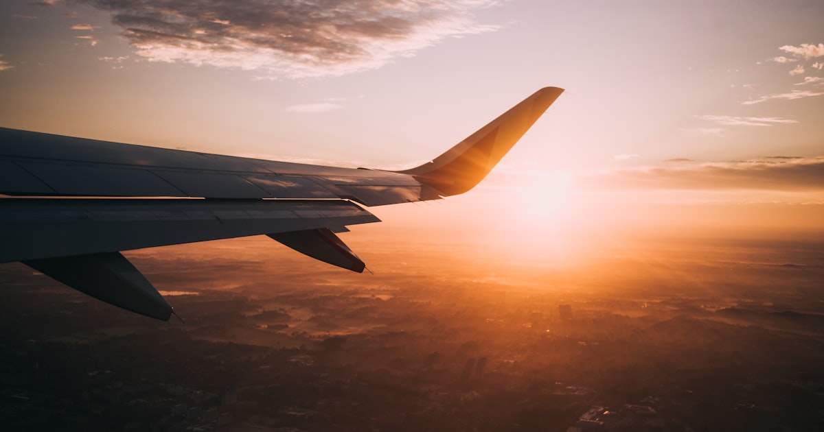 airplane on sky during golden hour