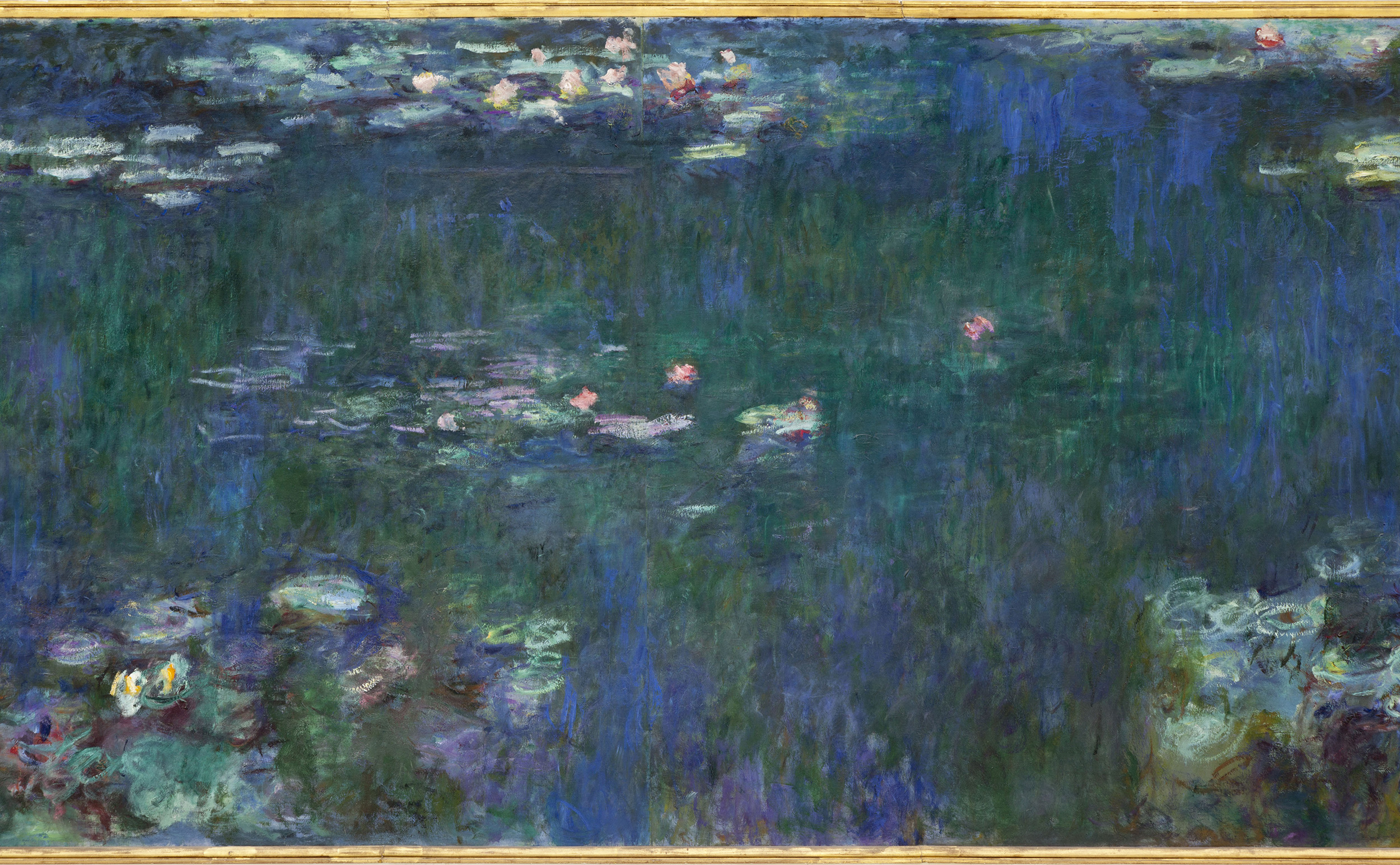 A panoramic view of Claude Monet's monumental Water Lilies murals in the Musée de l'Orangerie.